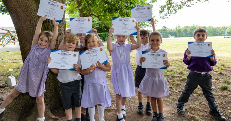 Epping Primary School pupils proudly showing their certificates