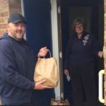EFDC staff collecting food from local butchers for food parcels for resident