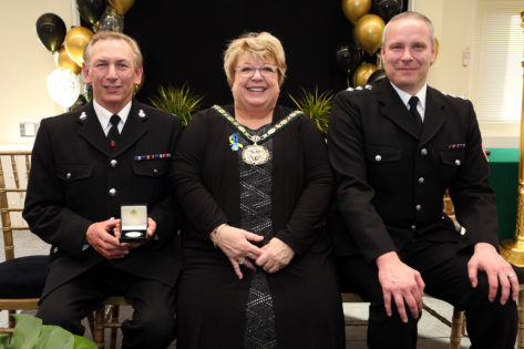 Community service medal - PC Andy Cook and Chairman of the Council, Helen Kane