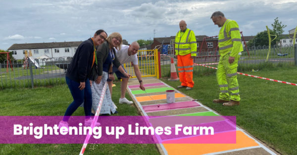 Officers painting a path leading to a park in orange, green and pink. Text- Brightening up Limes Farm
