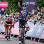 Lorena Wiebes of Team DSM salutes her victory after sprinting to win the stage on High Street Epping