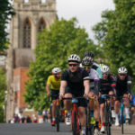 Cyclists in the RideLondon-Essex sportive pass through Epping