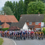 The peloton in the countryside near Fyfield in Essex