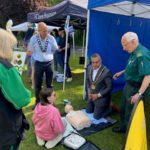 The East of England Ambulance Service showing the Chairman of Council, Vice-Chairman first aid.